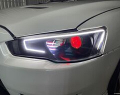 Ретрофит ( Тюнинг) фар Mitsubishi Lancer X